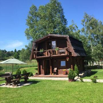 Фото номера Дом с 2 спальнями Дома для отпуска Domki Florentyna г. Wojcieszyce 19