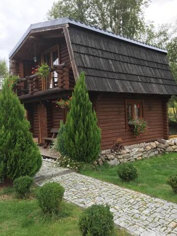 Фото номера Дом с 2 спальнями Дома для отпуска Domki Florentyna г. Wojcieszyce 9